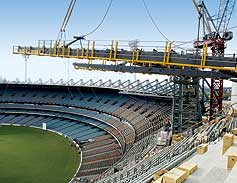 ICONIC ARENAS // The Melbourne Cricket Ground, above, is one of many landmark sporting arenas around the world that feature BlueScope Steel's products. When the current re-build is complete, the stadium will seat 100,000 people. Our Company has worked with customers like fabricator Alfasi Steel Constructions, and roof manufacturer Fielders, to provide structural steelwork and steel roofing. XLERPLATE®, ZINCALUME® and COLORBOND® steels all feature prominently in the redevelopment.